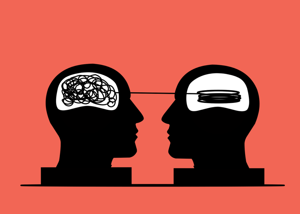 Illustration of two silhouetted heads facing each other, with one brain depicted as tangled lines and the other as organized loops, representing communication or mental clarity.